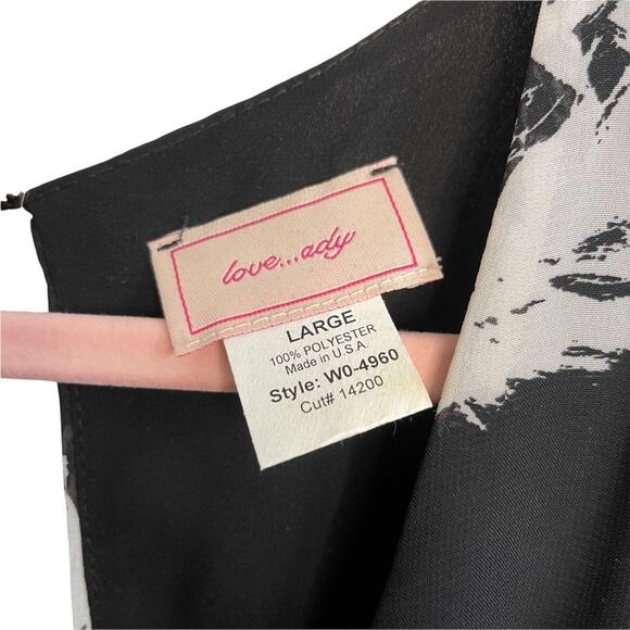 Love…Ady Black and White Floral Long Sleeve Romper - Picture 2 of 7